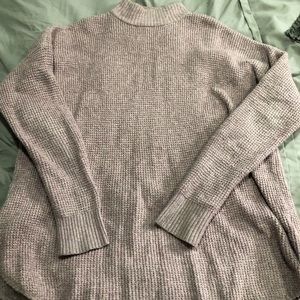 Pink turtleneck sweater